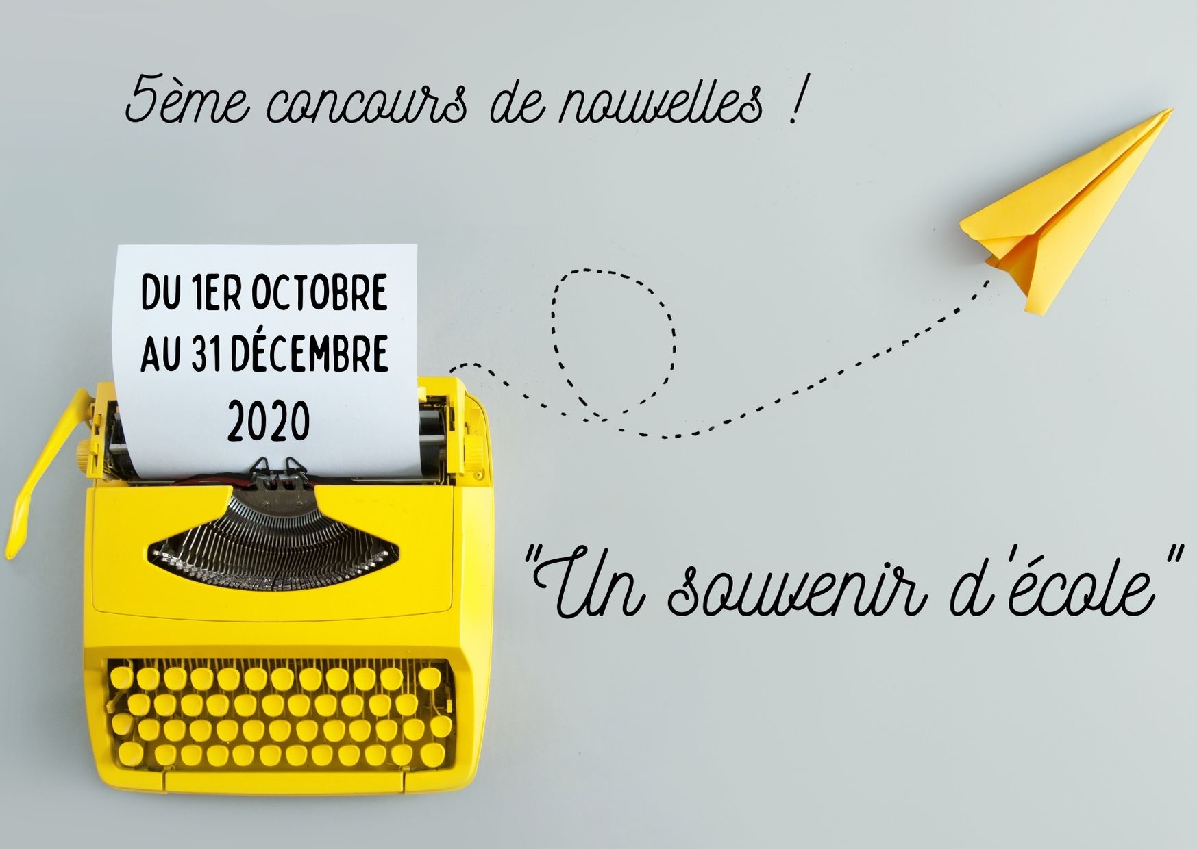 Machine à écrire jaune avec avion en papier jaune