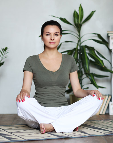 Femme en position de lotus